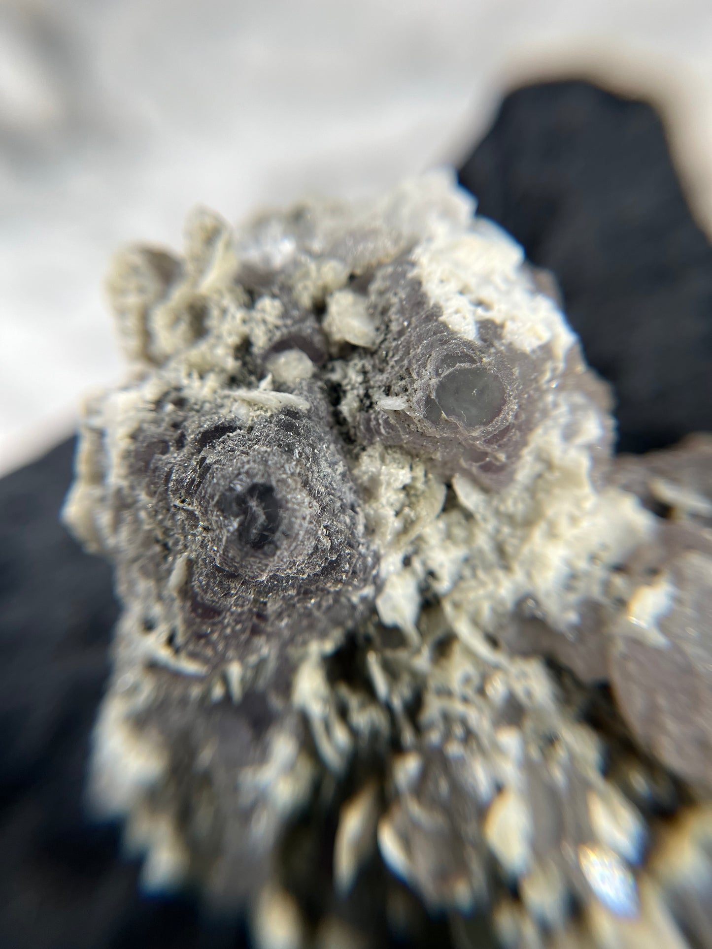 Purple Fluorite on Candle Quartz - China - UV Reactive - Phosphorescent