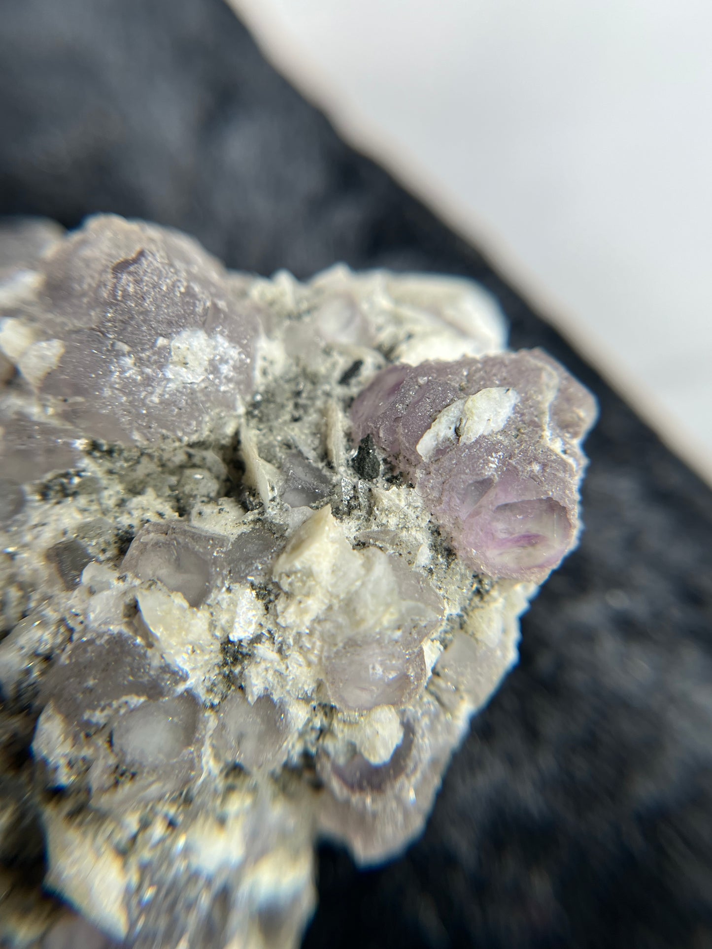 Purple Fluorite on Candle Quartz - China - UV Reactive - Phosphorescent
